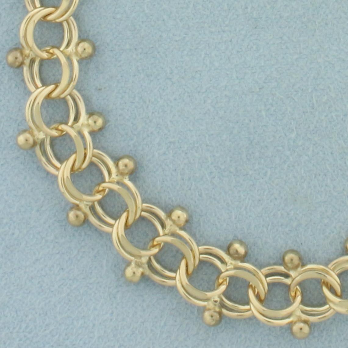 Double Loop And Bead Charm Bracelet In 14k Yellow Gold