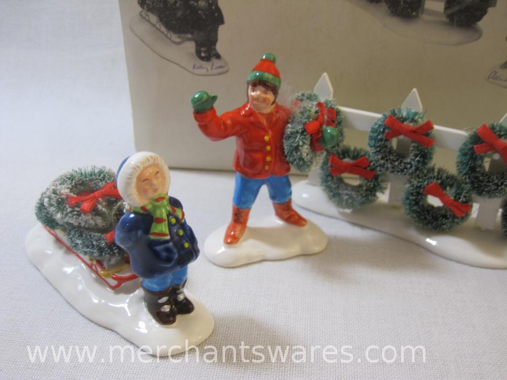 Two Department 56 Snow Village Accessories including "Round & Round We Go!" and "Wreaths for Sale",