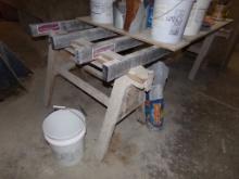 (2) Heavy Duty Saw Horses And (4) Magnesium Screeds, Used As A Table In Fro