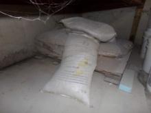 Partial Pallet in Back Corner Under Shelving, Bags of Assorted Aggregates,