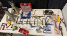 Jack stands, Kreg Tools featherboard, craftsman bits, large wrench, steel file, measure and
