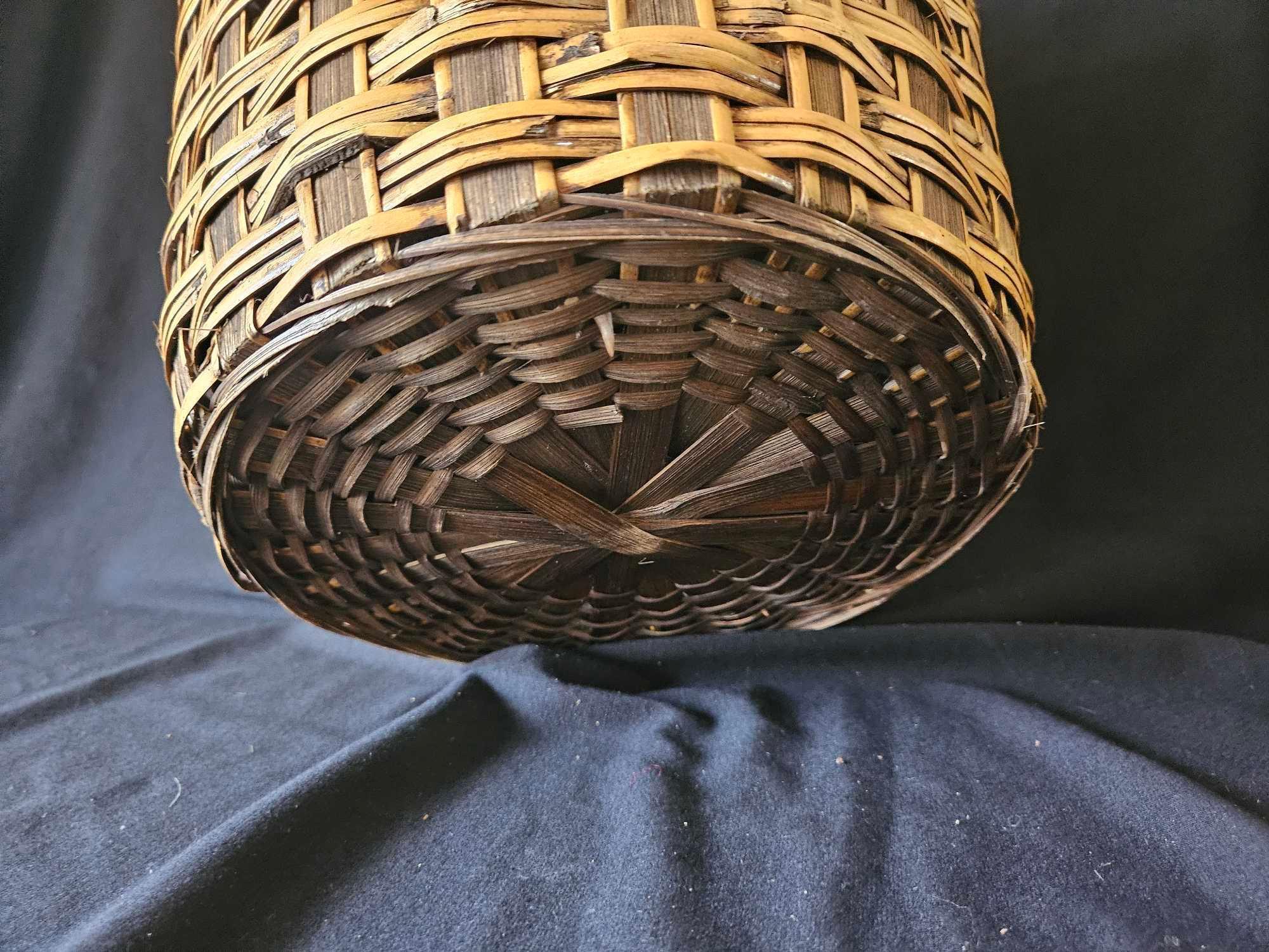 LARGE VINTAGE WOVEN BASKET WITH CURIOUSLY LARGE PINECONES