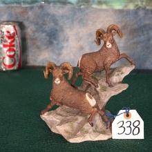 Porcelain Statue of a Pair of Rocky Mountain Bighorn Rams