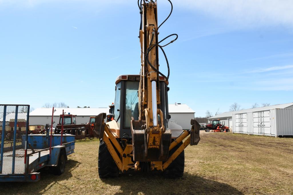 NEW HOLLAND 555E BACKHOE