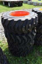 4 Solidmax HD 12-16.5 Skid Steer tires on 8 Lug Rims