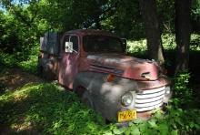 **T** 1950 Ford F-3 w/Flat-head V8, ran when parked, motor is loose, TITLED (Sales tax & title fees
