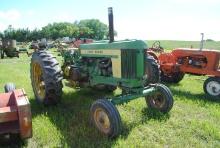 1957 John Deere 720 tractor, wide front, 540 pto, single hydraulics, has new hour meter so it is not