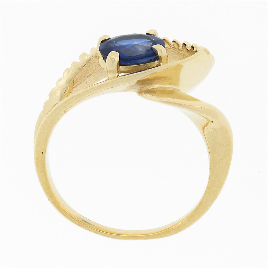 14k Gold 0.80 ctw Oval Sapphire Solitaire Polished Grooved Open Loop Bypass Ring