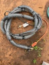 heat tape on garden hose and wrapped with insulation