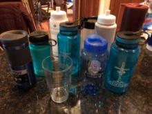 Assortment of water bottles, etc