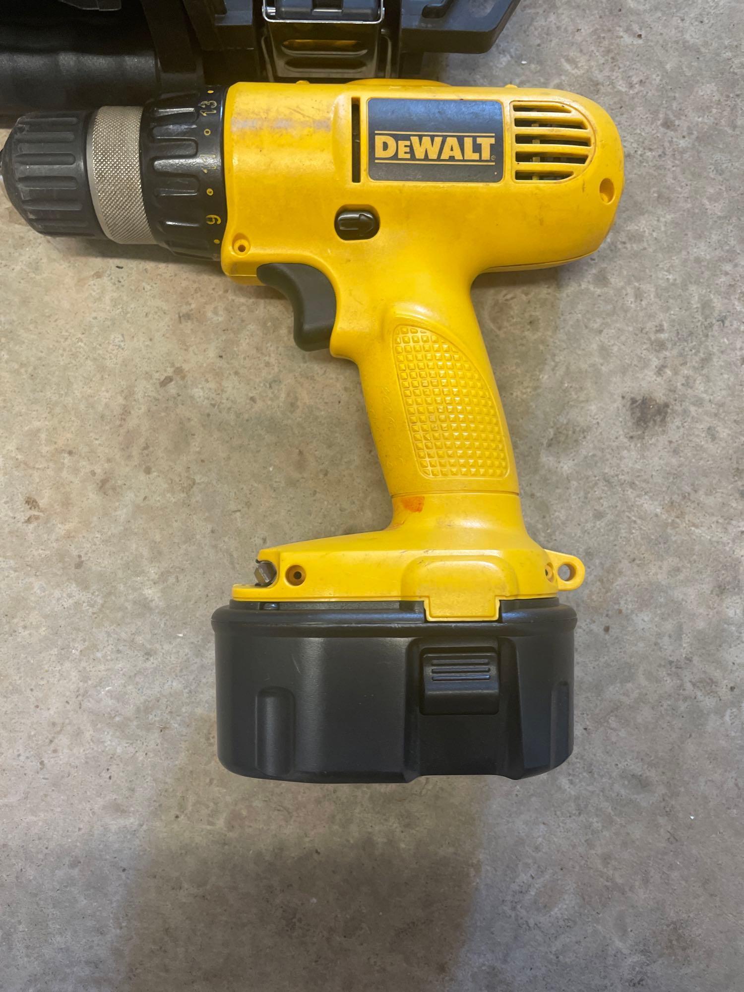 power drill; charger; extra battery