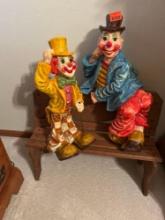 clowns on a bench