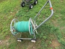 water hose caddy with water hose