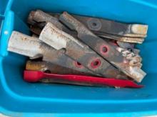 tub full of various sizes and sets of mower blades