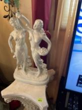 Two womens statue holding a something with stand statue is 25 inches tall and the stand is 29 1/2