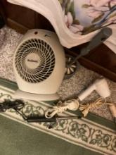 bird towel and hand towel very pretty small fan curling iron and blow dryer and towel brush