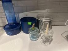 Canister set metal with flour in it two blue canisters, tall blue jar with antique lid, small with