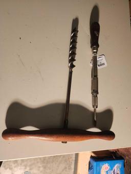 One wood handled auger drill bit and one ratchet screwdriver. Used.