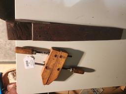 One old wood clamp and one antique wooden leather harness makers hand vise. circa 1800's. used.