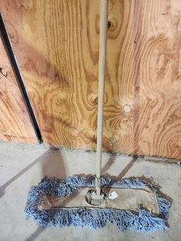 Two Rubbermaid yellow mop buckets with mop squeegee and one small dust mop Used.