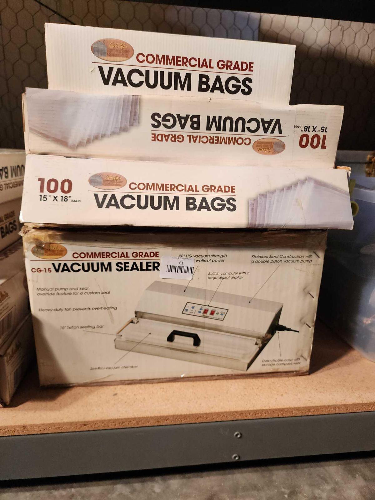 Cabela's commercial grade vacuum sealer, used and three boxes of vacuum bags, new.