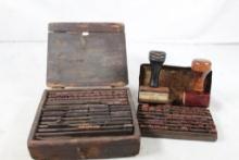 Antique ink stamp pad and ink stamps. Used.
