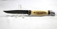 Small Kinfolk Sheath knife with 3.25 inch blade and bone scales. Leather sheath.