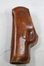 Brown's dark tan belt clip holster for Ruger 9E. Used, right handed inside.