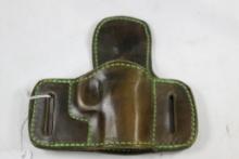 One dark brown greenish belt holster for 1911. Used, right handed.