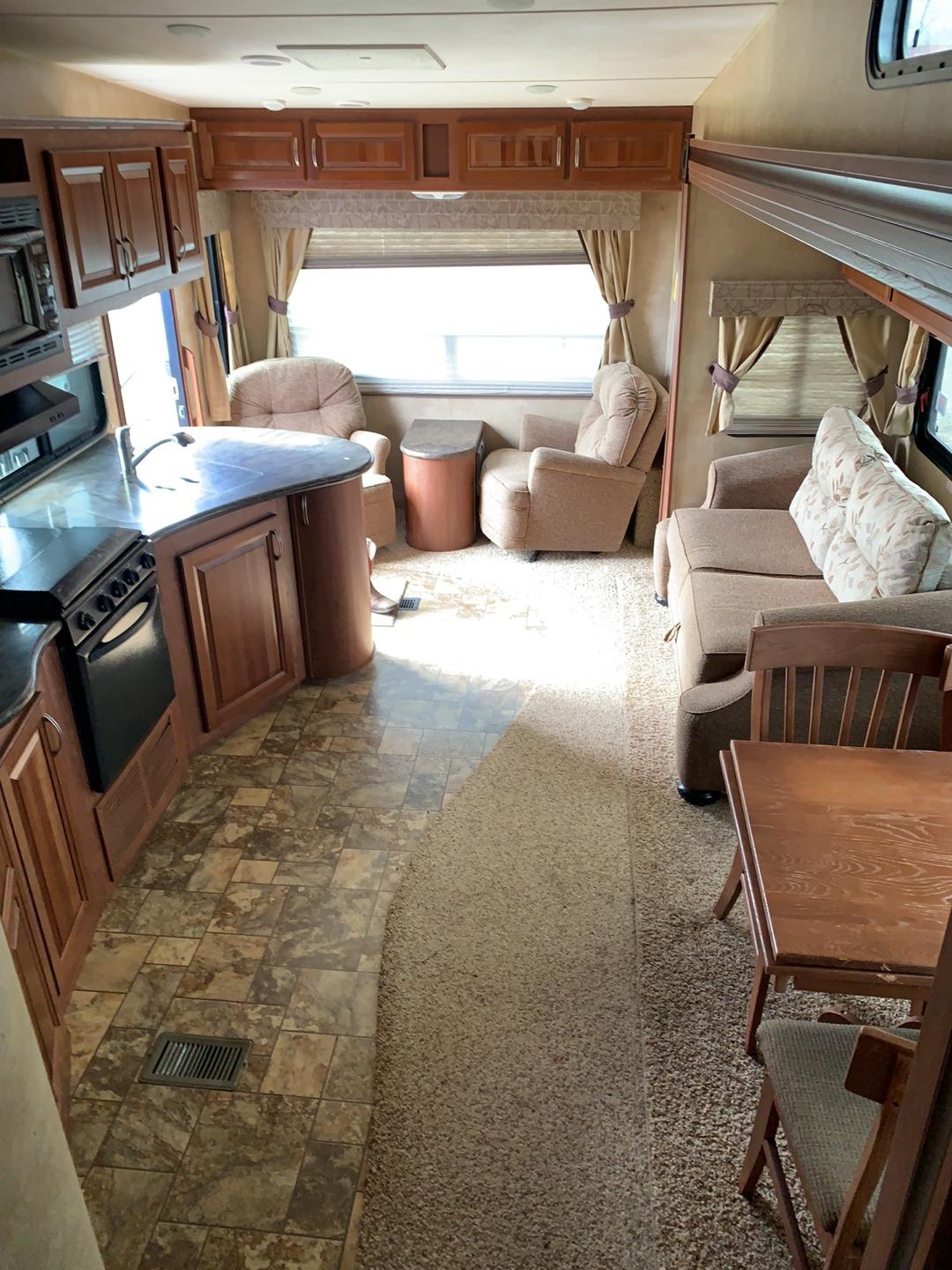 2012 Forest River- Wild Cat Sterling Fifth Wheel 33’ Camper Trailer with Two Slide Outs