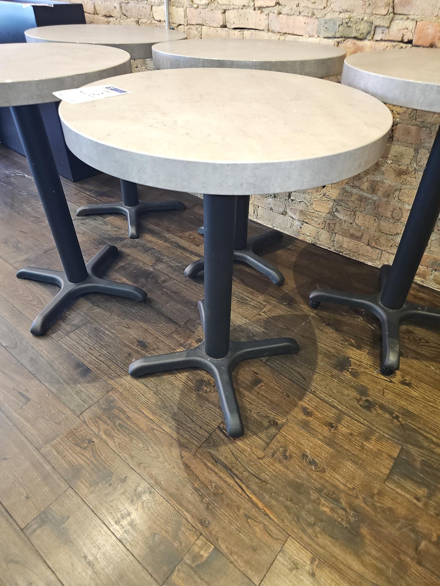 Round tables with metal pedestal base