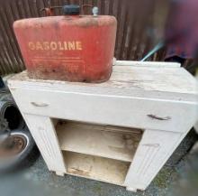 USED 38 INCH CABINET WITH ANTIQUE GAS JUG