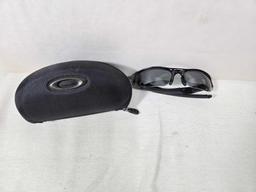 4 Pair of Pre-Owned Men's Sunglasses Incl. Oakley, Armani, & Timberland