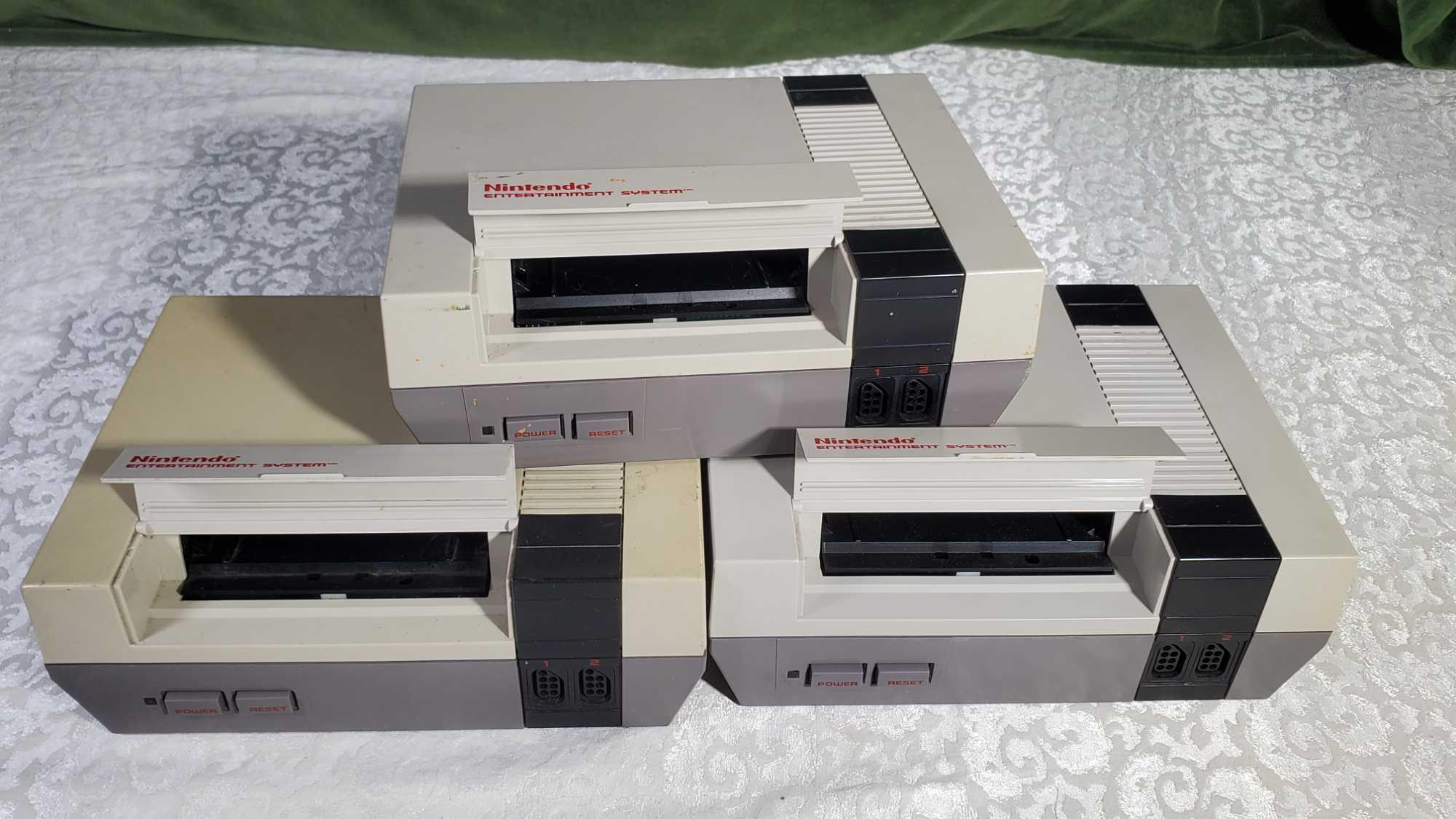 3 1985 Nintendo Entertainment Centers with 3 Controllers, 15 Game Cartridges and More