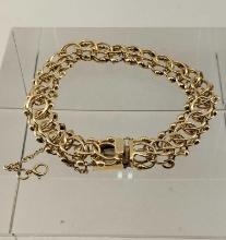 14K Yellow Gold Artistic Triple Link Bracelet With Safety Chain And Locking Push Button Clasp