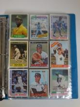 BINDER WITH 1960S 1970S 1980S BASEBALL AND FOOTBALL CARDS