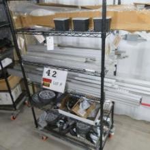 Rack w/Contents:  Castor Wheels, Roller Chain, Axle Stops, Aluminum Mounting Brackets & Hardware