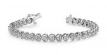 14KT WHITE GOLD .90 CTW G-H VS2/SI1 FLOATING DIAMOND HEART BRACELET