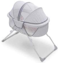 Delta Children Ultra Compact Travel Bassinet with Full Canopy