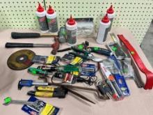 Lot of asst. tools, some unused, Chalk, pry bars, hammers, wrenches and more