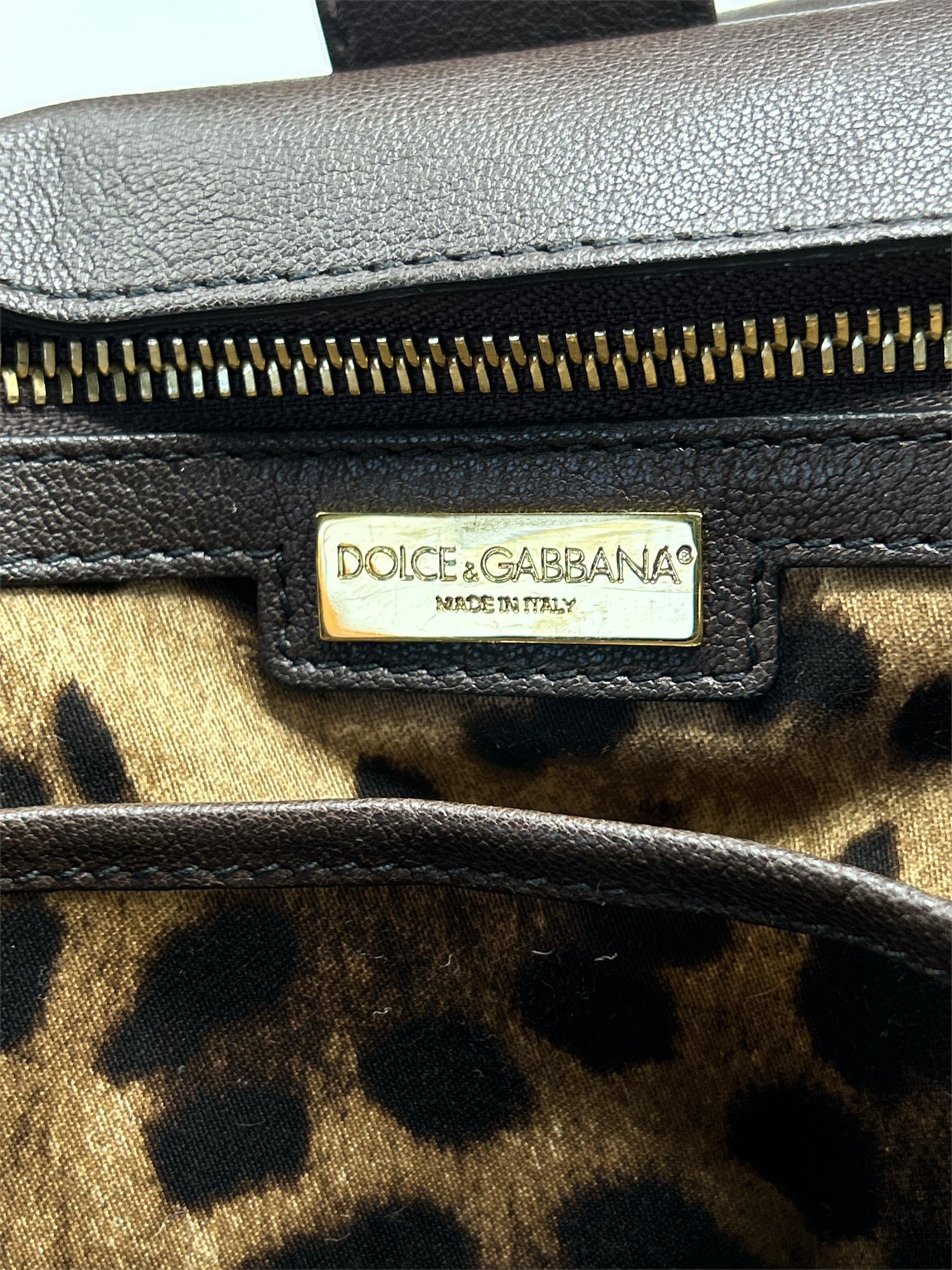 Dolce and Gabbana pink sequin, python, and leather purse