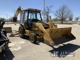 (Kansas City, MO) 2000 Cat 426C Tractor Loader Backhoe Runs, Moves, & Operates) (Leaking Oil Under C