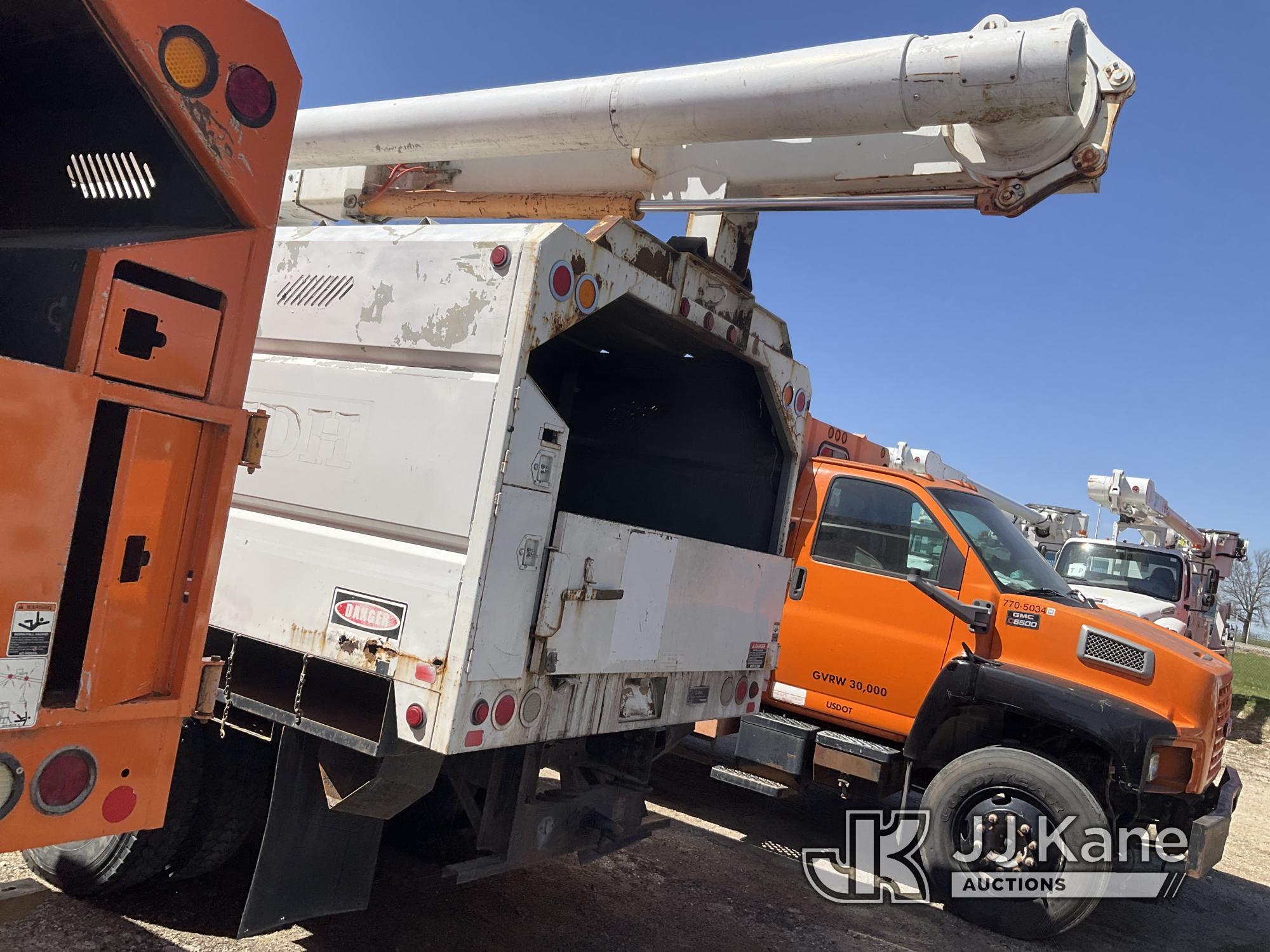 (Kansas City, MO) Altec LRV55, Over-Center Bucket Truck mounted behind cab on 2006 GMC C7500 Chipper