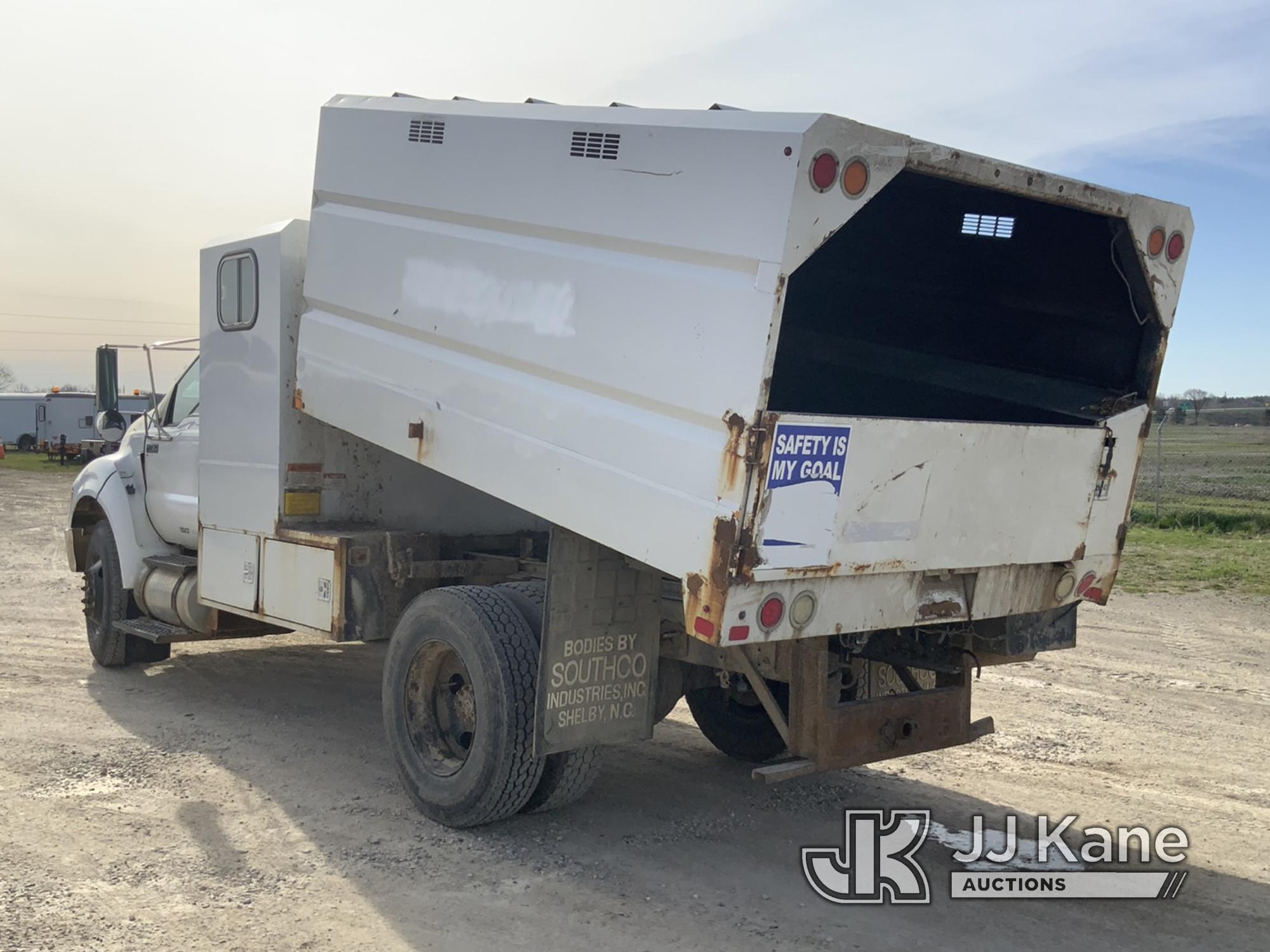 (Charlotte, MI) 2011 Ford F750 Chipper Dump Truck Runs, Moves, Dump Operates, Service Engine Light.