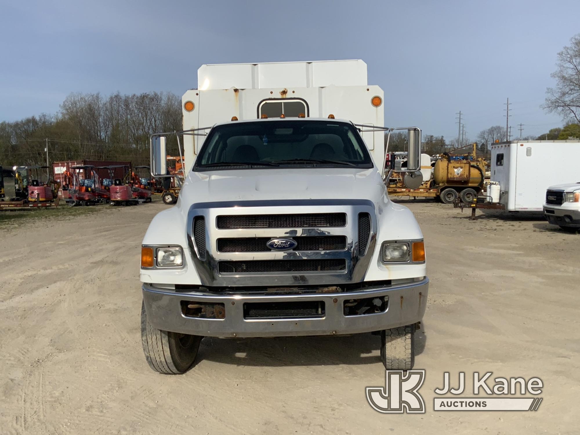 (Charlotte, MI) 2011 Ford F750 Chipper Dump Truck Runs, Moves, Dump Operates, Service Engine Light.