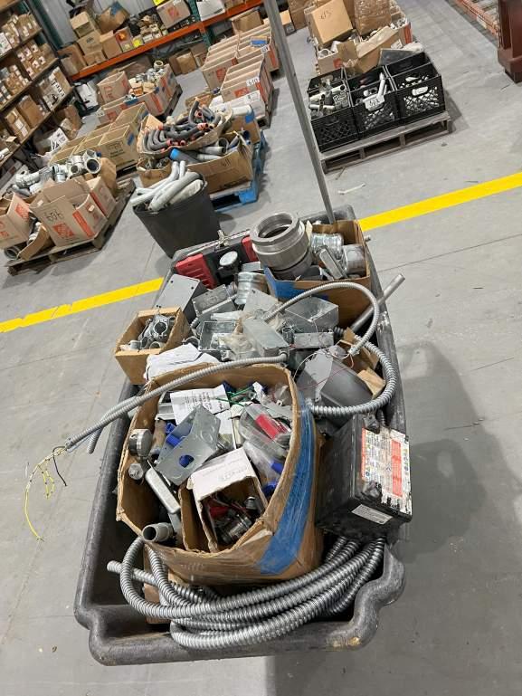 RUBBERMAID TRASH CART WITH ASSORTED ELECTRICAL PARTS