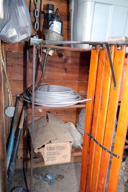 Roll of barbwire, Electrical wire, bench, showbox, galvanized wash tubs, Havahart traps, garden cart