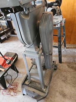 Delta fourteen inch band saw on rolling cart