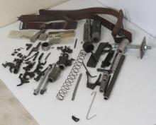 Mixed rifle parts and tools  Note: The decedent was known to assemble ak47 rifles.