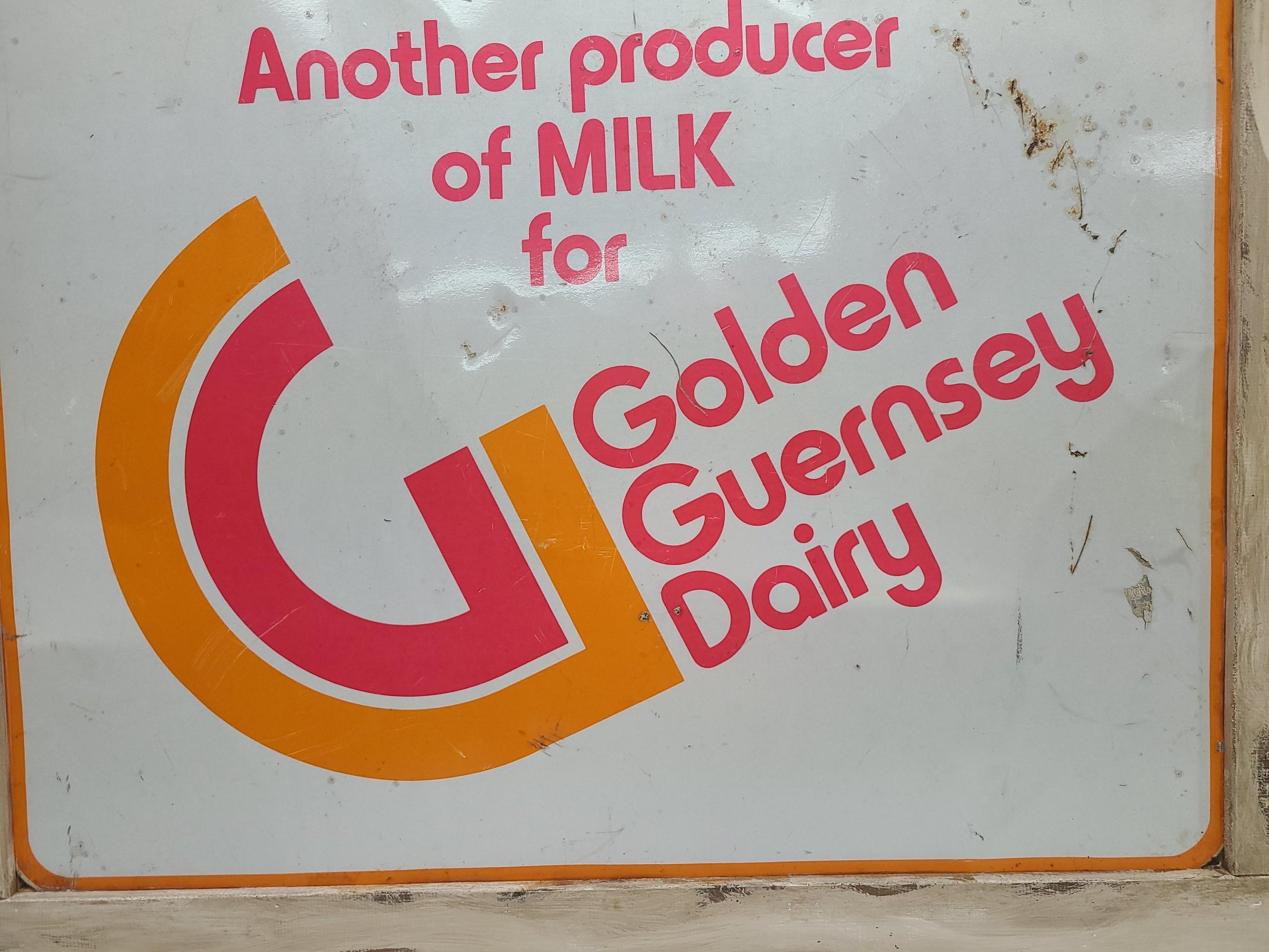 DST,  Golden Guernsey Dairy Sign